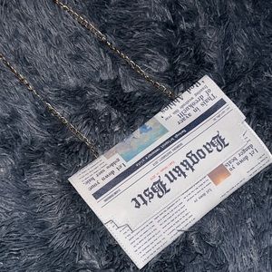 Magazine crossbody purse
